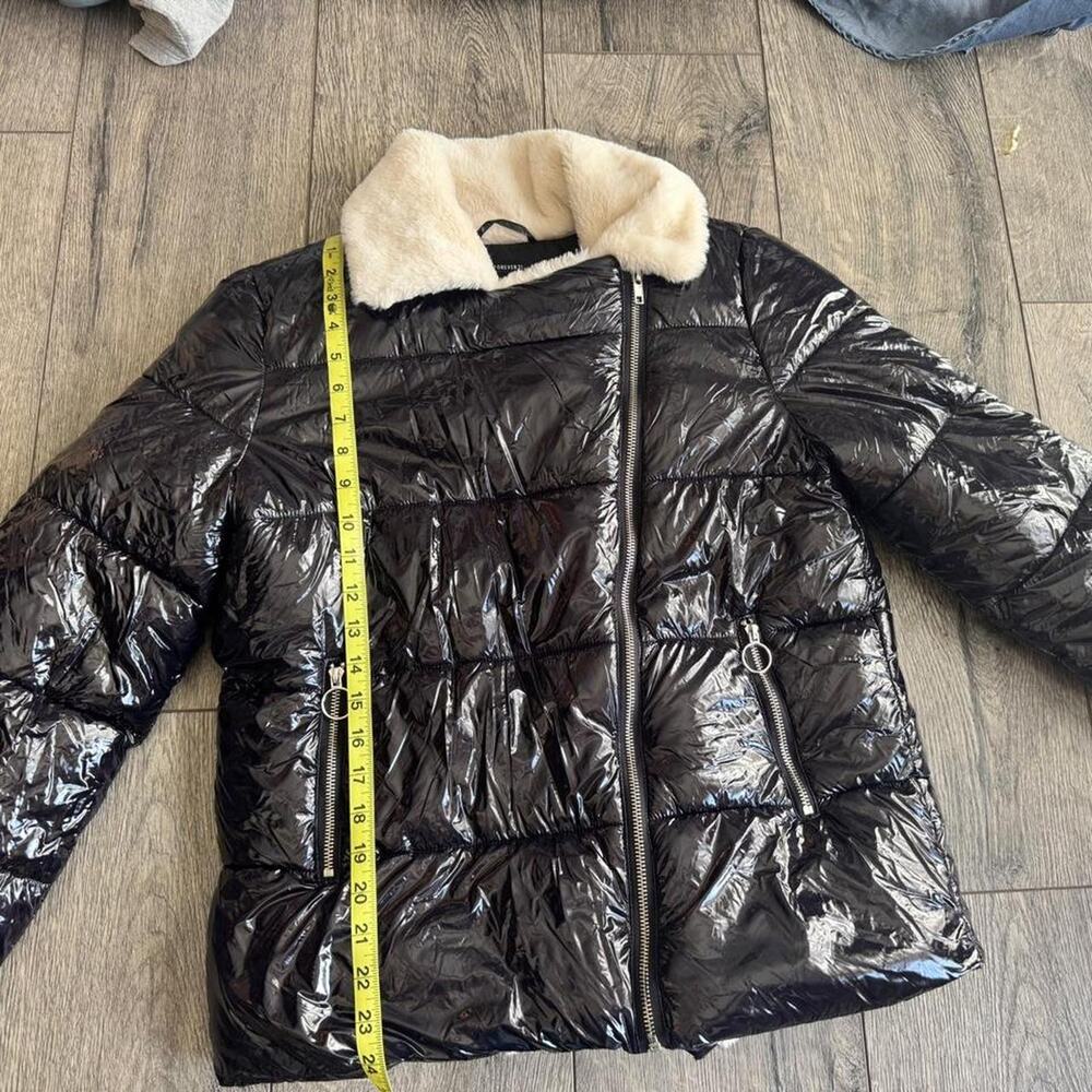 Black puffer jacket with fur trim